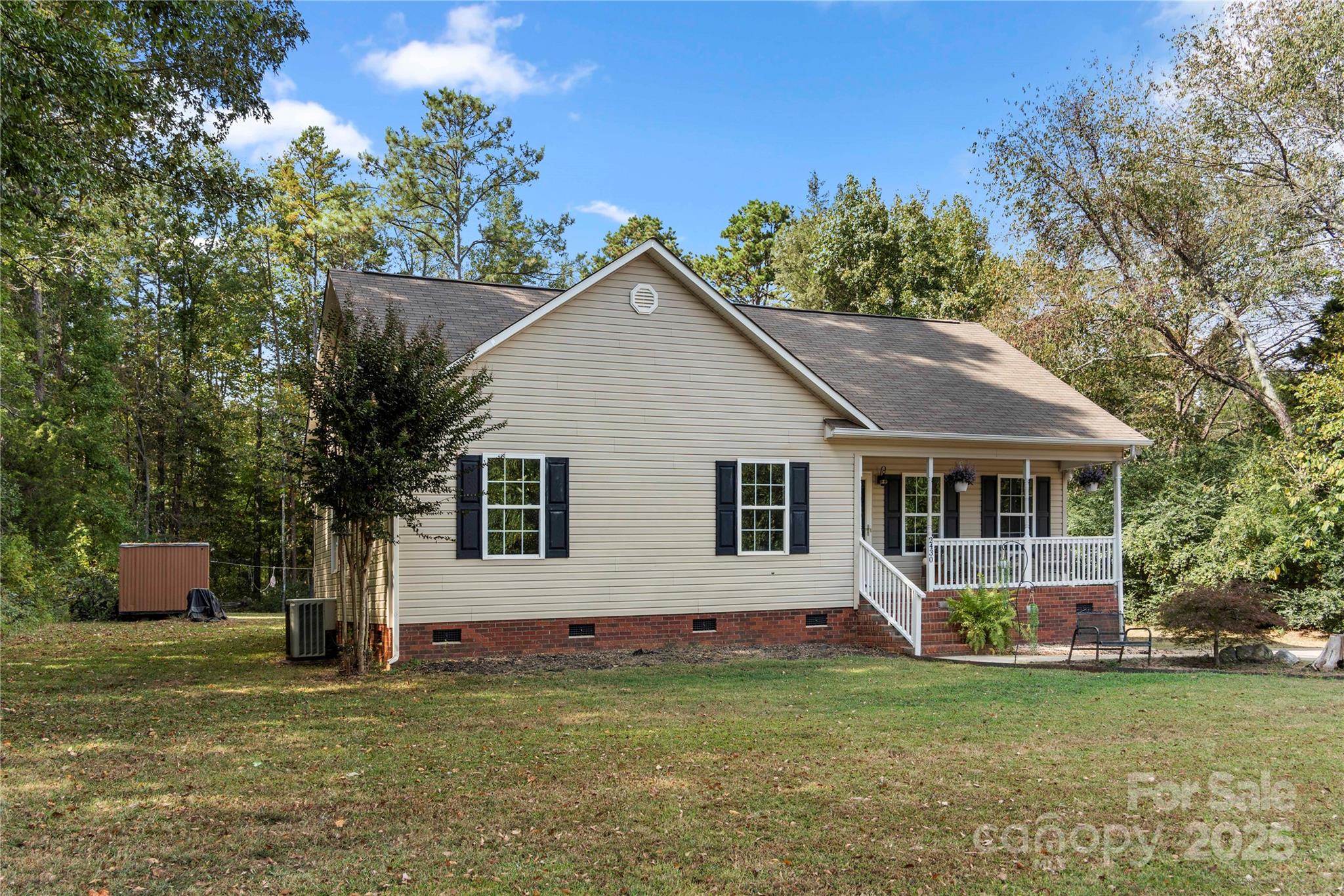 2430 Dr Nichols Road York, SC 29745 - Photo 1 of 26 a front view of a house with a garden