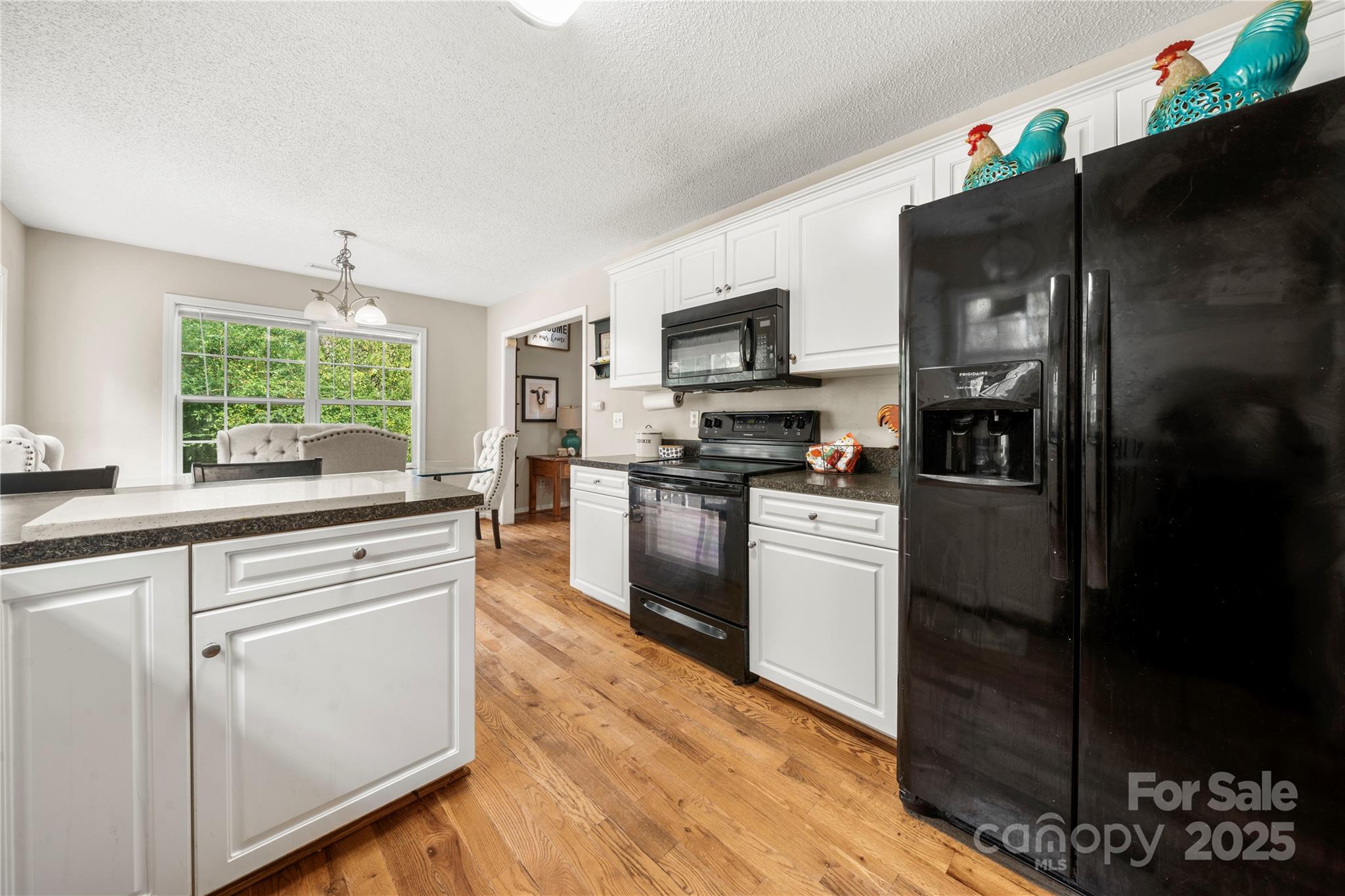 2430 Dr Nichols Road York, SC 29745 - Photo 11 of 26 a kitchen with stainless steel appliances a refrigerator sink and microwave