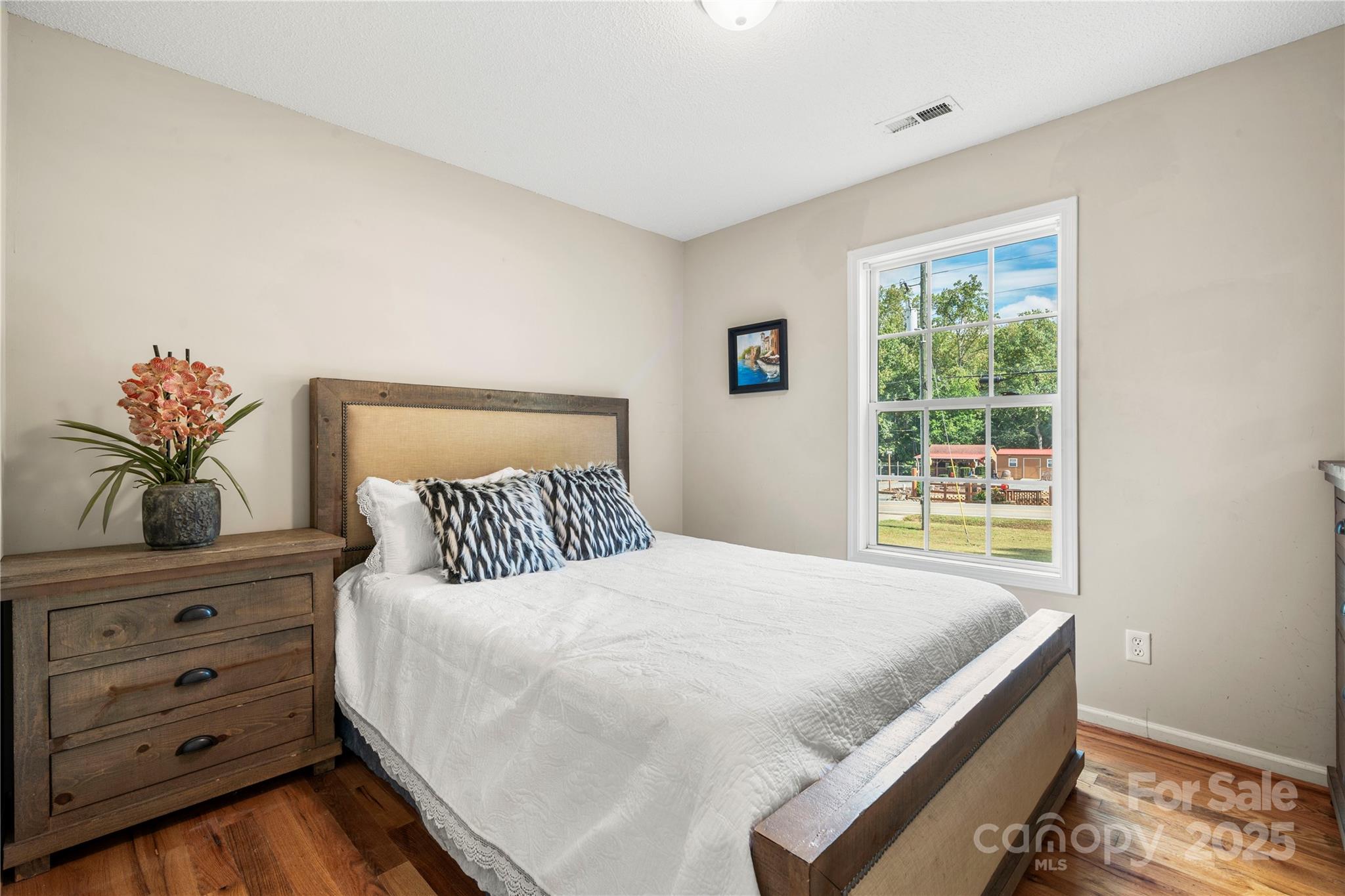 2430 Dr Nichols Road York, SC 29745 - Photo 21 of 26 a bedroom with a bed and a window