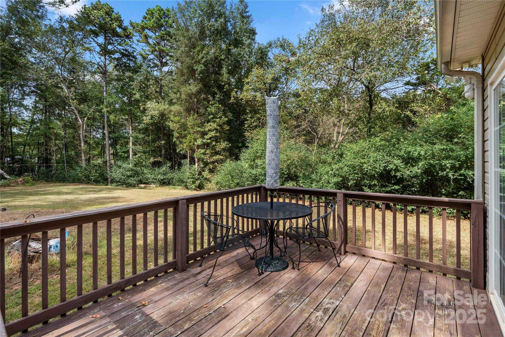 2430 Dr Nichols Road York, SC 29745 - Photo 8 of 26 a balcony with wooden floor and fence