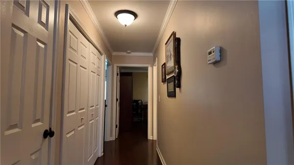 a view of a hallway with entryway