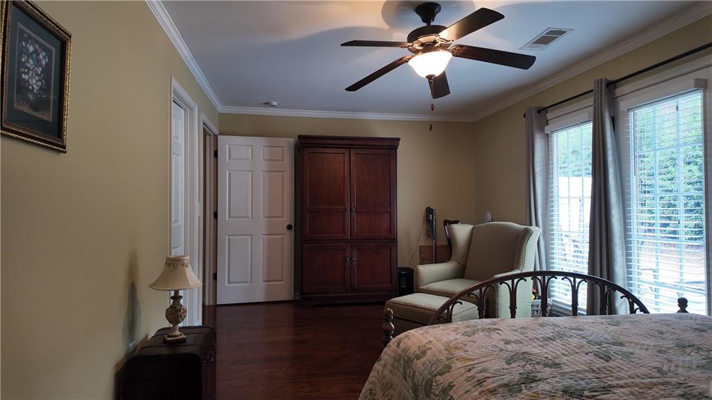 115 Old Mill Drive Calhoun, GA 30701 - Photo 30 of 39 a living room with furniture two air conditioner vent and a window