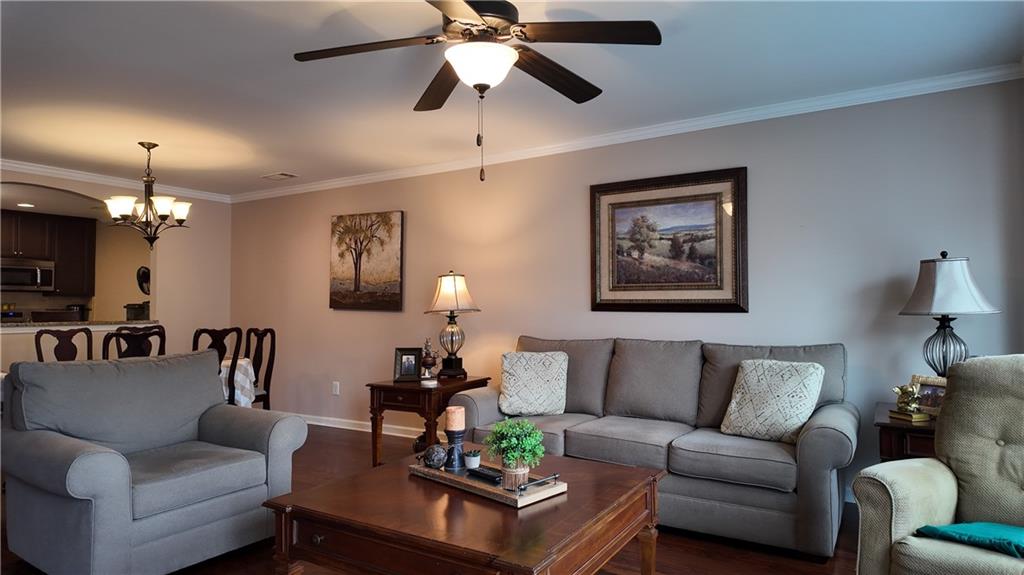 115 Old Mill Drive Calhoun, GA 30701 - Photo 3 of 39 a living room with furniture and a flat screen tv