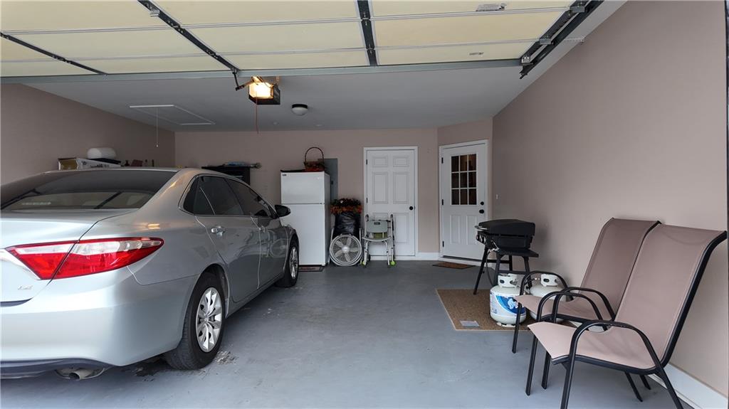 115 Old Mill Drive Calhoun, GA 30701 - Photo 31 of 39 a car is parked in a room