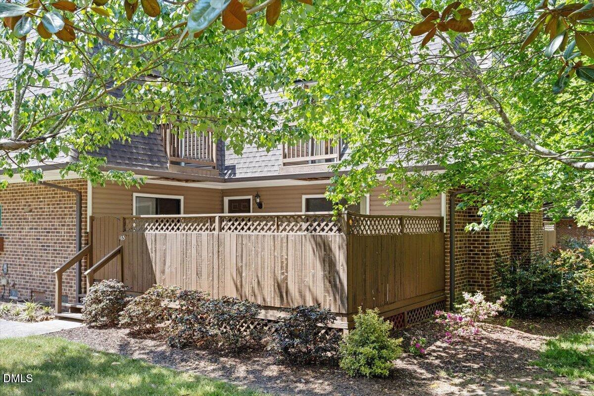 163 Springberry Lane Chapel Hill, NC 27517 - Photo 27 of 32 a front view of a house with a yard