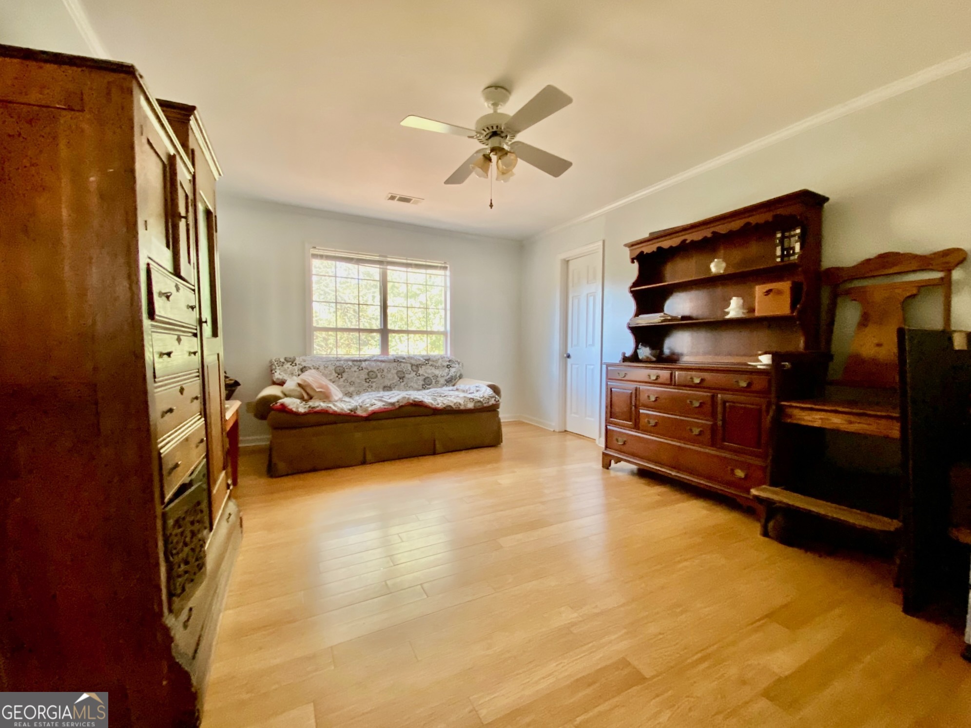 293 Osage Circle Byron, GA 31008 - Photo 12 of 31 a bedroom with furniture and window