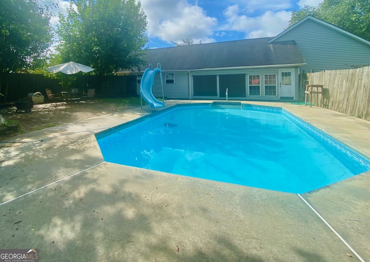 293 Osage Circle Byron, GA 31008 - Photo 20 of 31 a view of a house with a yard