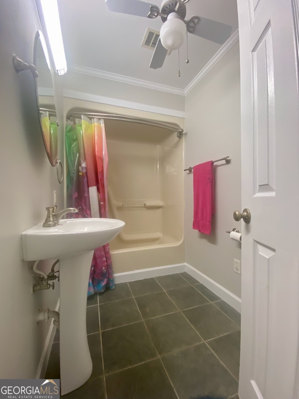 293 Osage Circle Byron, GA 31008 - Photo 25 of 31 a bathroom with a sink a bath tub and shower