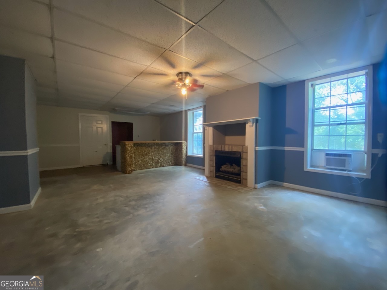 293 Osage Circle Byron, GA 31008 - Photo 27 of 31 a view of a livingroom with furniture and a fireplace