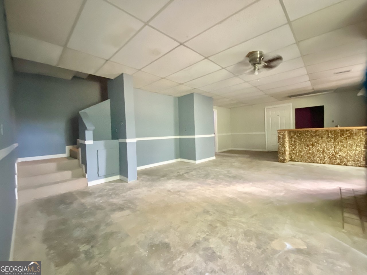 293 Osage Circle Byron, GA 31008 - Photo 28 of 31 a view of a livingroom with a furniture and a ceiling fan