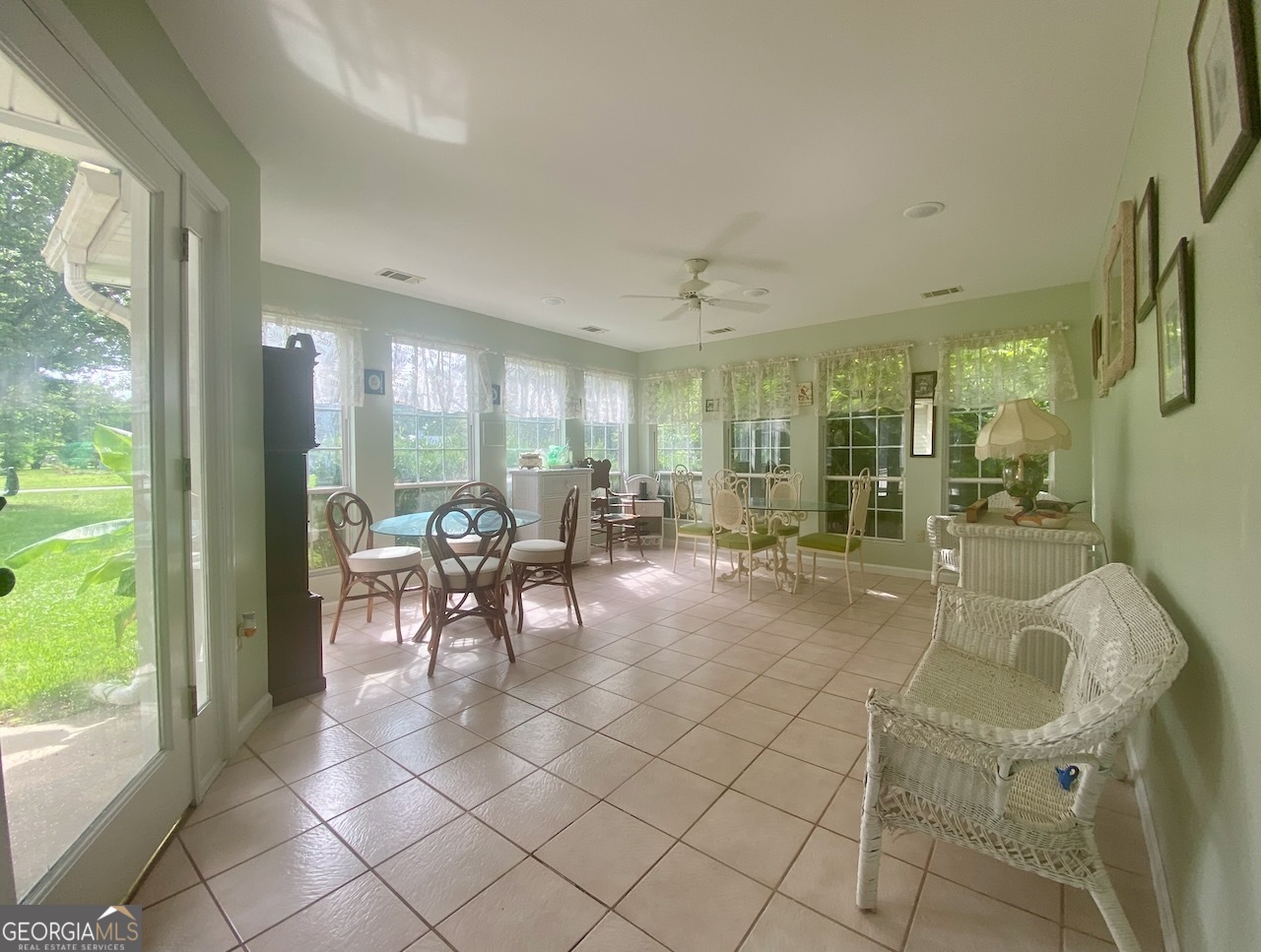 293 Osage Circle Byron, GA 31008 - Photo 3 of 31 a lobby with furniture and a large window