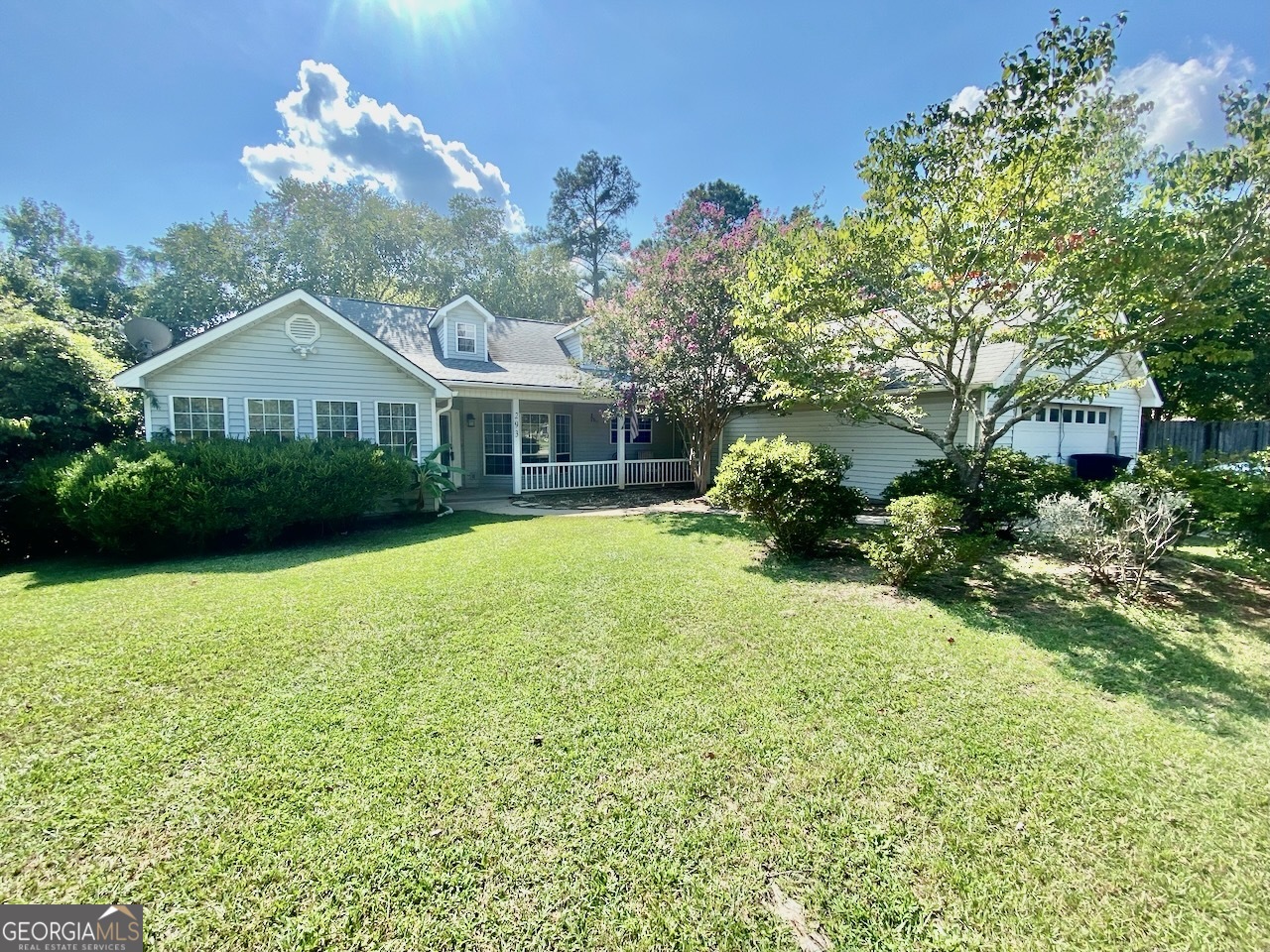 293 Osage Circle Byron, GA 31008 - Photo 31 of 31 a house view with a garden space