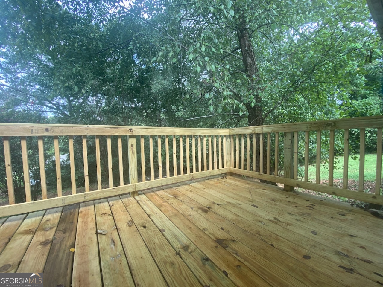 293 Osage Circle Byron, GA 31008 - Photo 8 of 31 a view of balcony with wooden floor