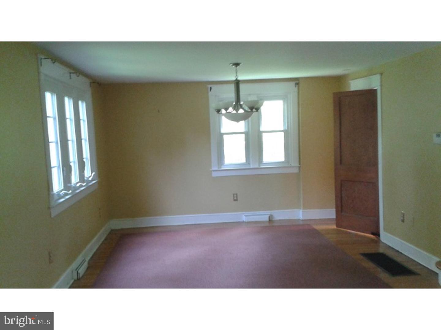 1507 Old Orchard Road Media, PA 19063 - Photo 3 of 14 a room with a window and chandelier