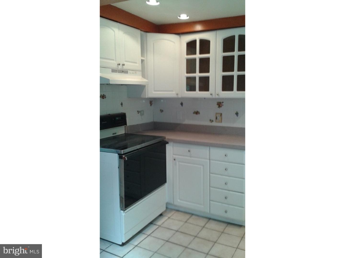 1507 Old Orchard Road Media, PA 19063 - Photo 4 of 14 a kitchen with a sink and cabinets