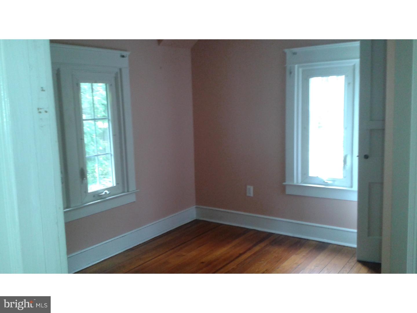 1507 Old Orchard Road Media, PA 19063 - Photo 9 of 14 a black and white photo of a living room