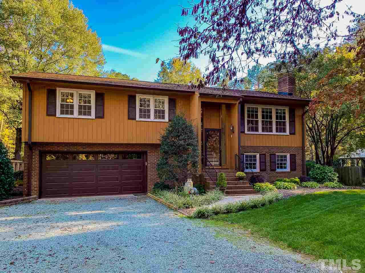 1307 Bill Poole Road Rougemont, NC 27572 - Photo 1 of 30 a front view of a house with garden