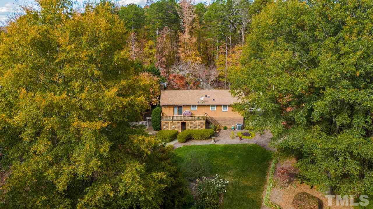 1307 Bill Poole Road Rougemont, NC 27572 - Photo 11 of 30 a view of a house with a yard