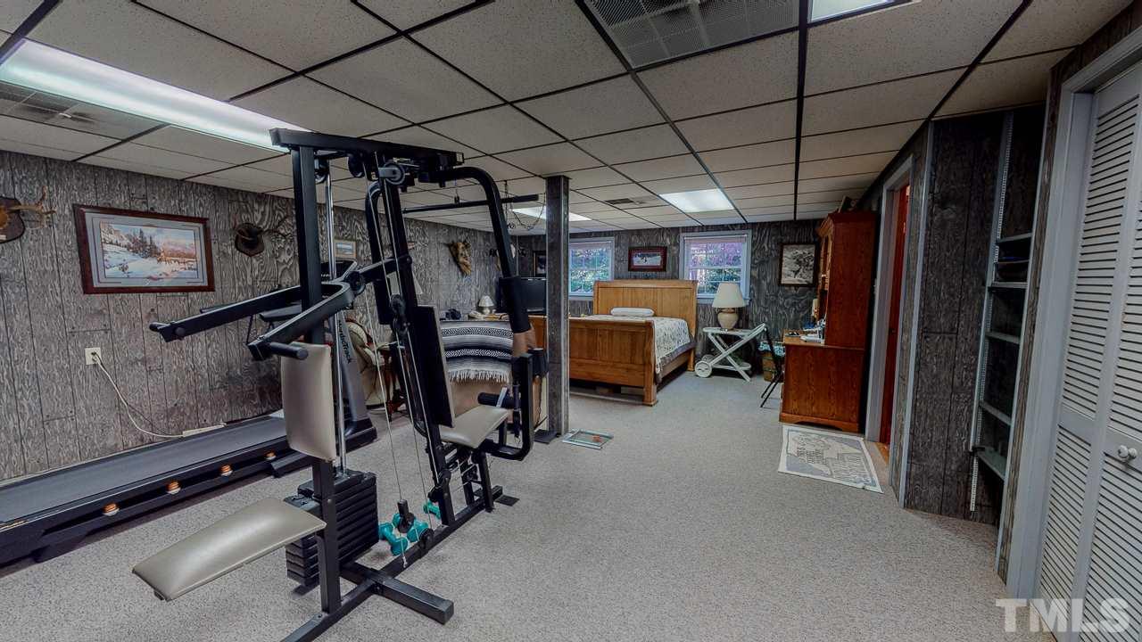 1307 Bill Poole Road Rougemont, NC 27572 - Photo 22 of 30 a view of a room with gym equipment