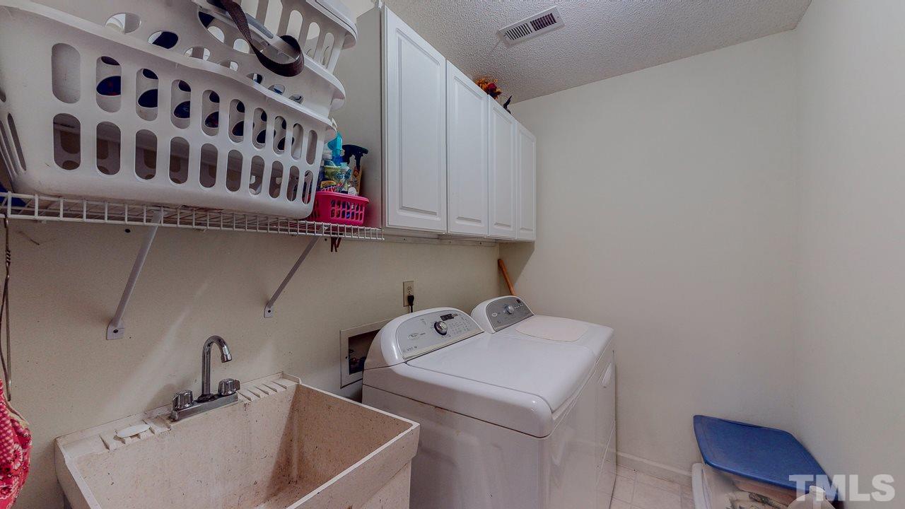 1307 Bill Poole Road Rougemont, NC 27572 - Photo 24 of 30 a utility room with dryer and washer