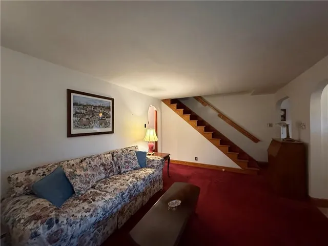 a kitchen with a sink appliances and cabinets