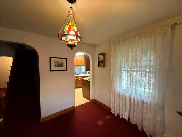 a view of a hallway with workspace