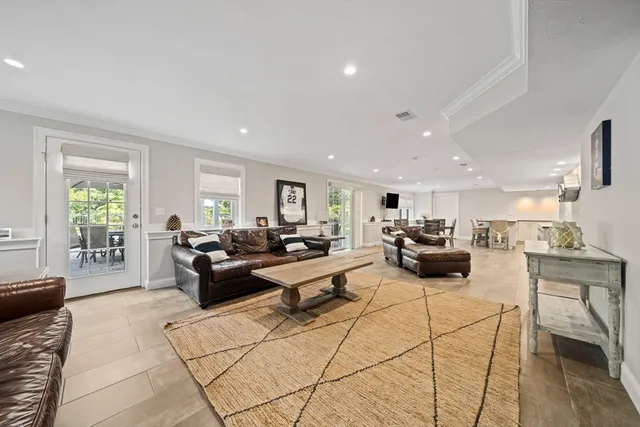 a living room with furniture and a table