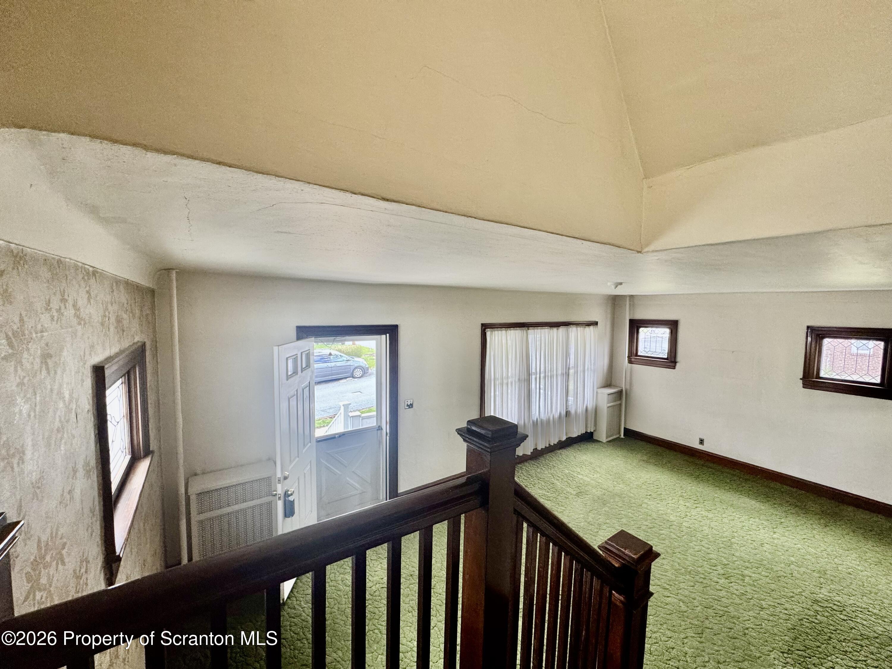 2120 Myrtle Street Scranton, PA 18510 - Photo 15 of 42 a view of a big room with windows
