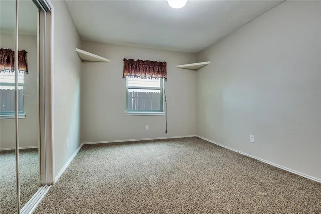 a bathroom with a toilet and a bathtub