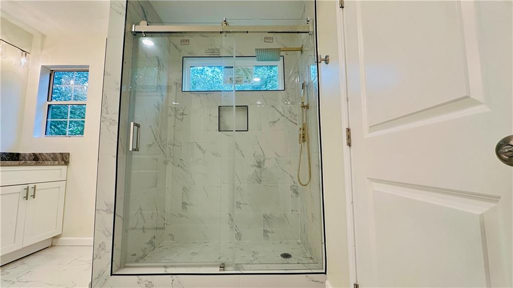 3428 Chapel Park Drive Decatur, GA 30034 - Photo 13 of 35 a bathroom with a shower and a sink