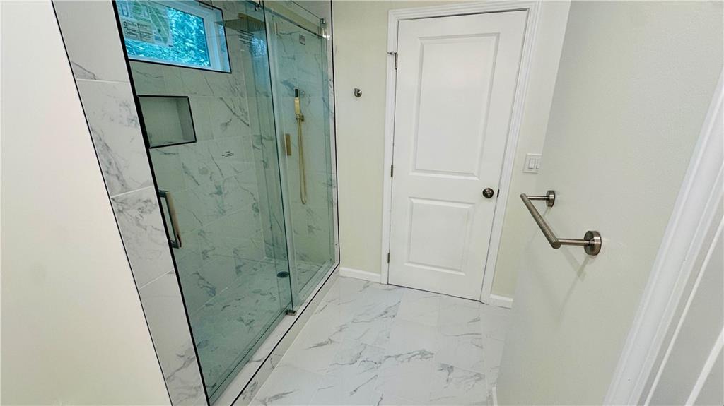 3428 Chapel Park Drive Decatur, GA 30034 - Photo 14 of 35 a bathroom with a shower and a sink