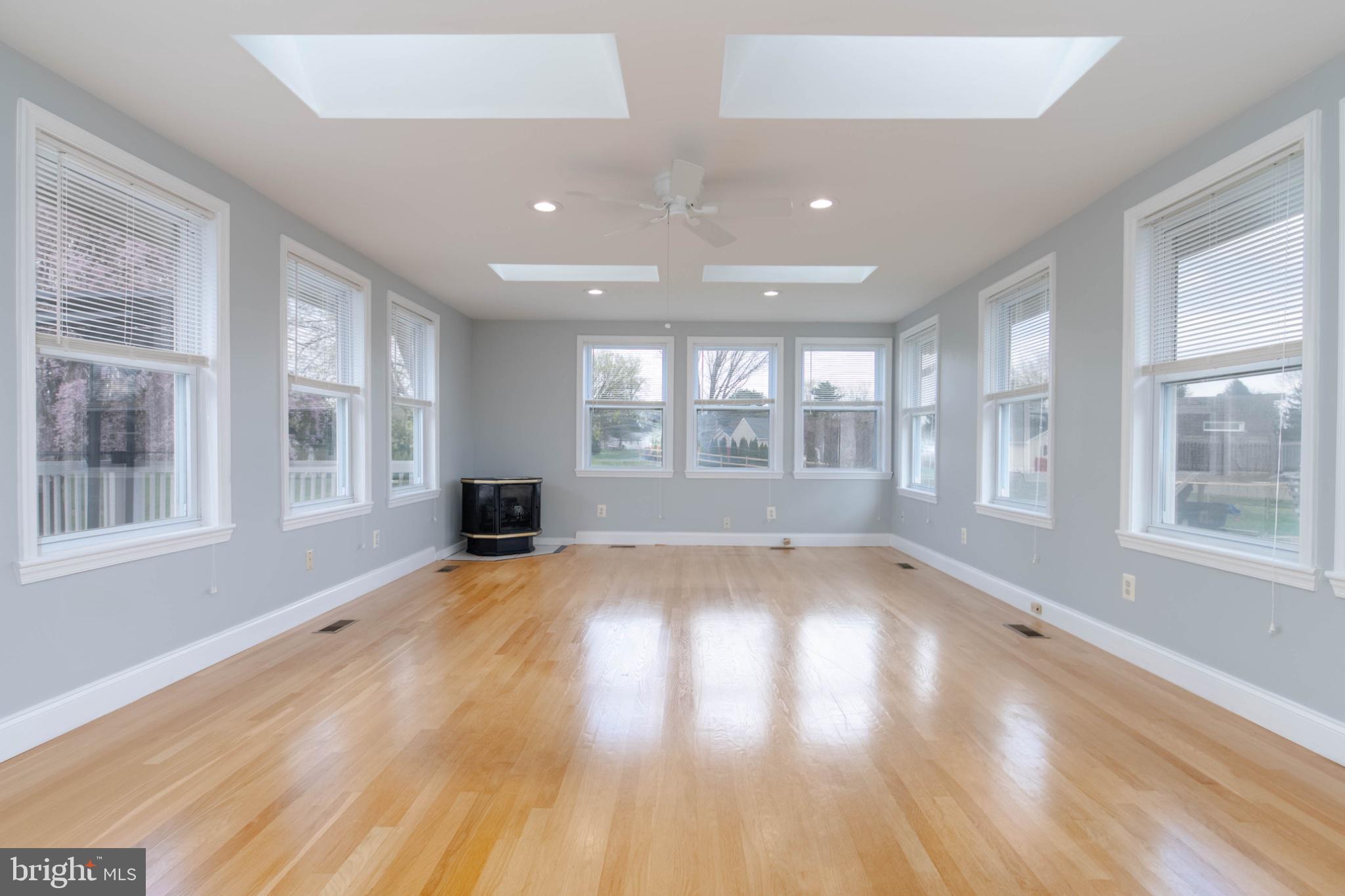 1909 Nelson Mill Road Jarrettsville, MD 21084 - Photo 26 of 65 a view of an empty room with wooden floor and a window