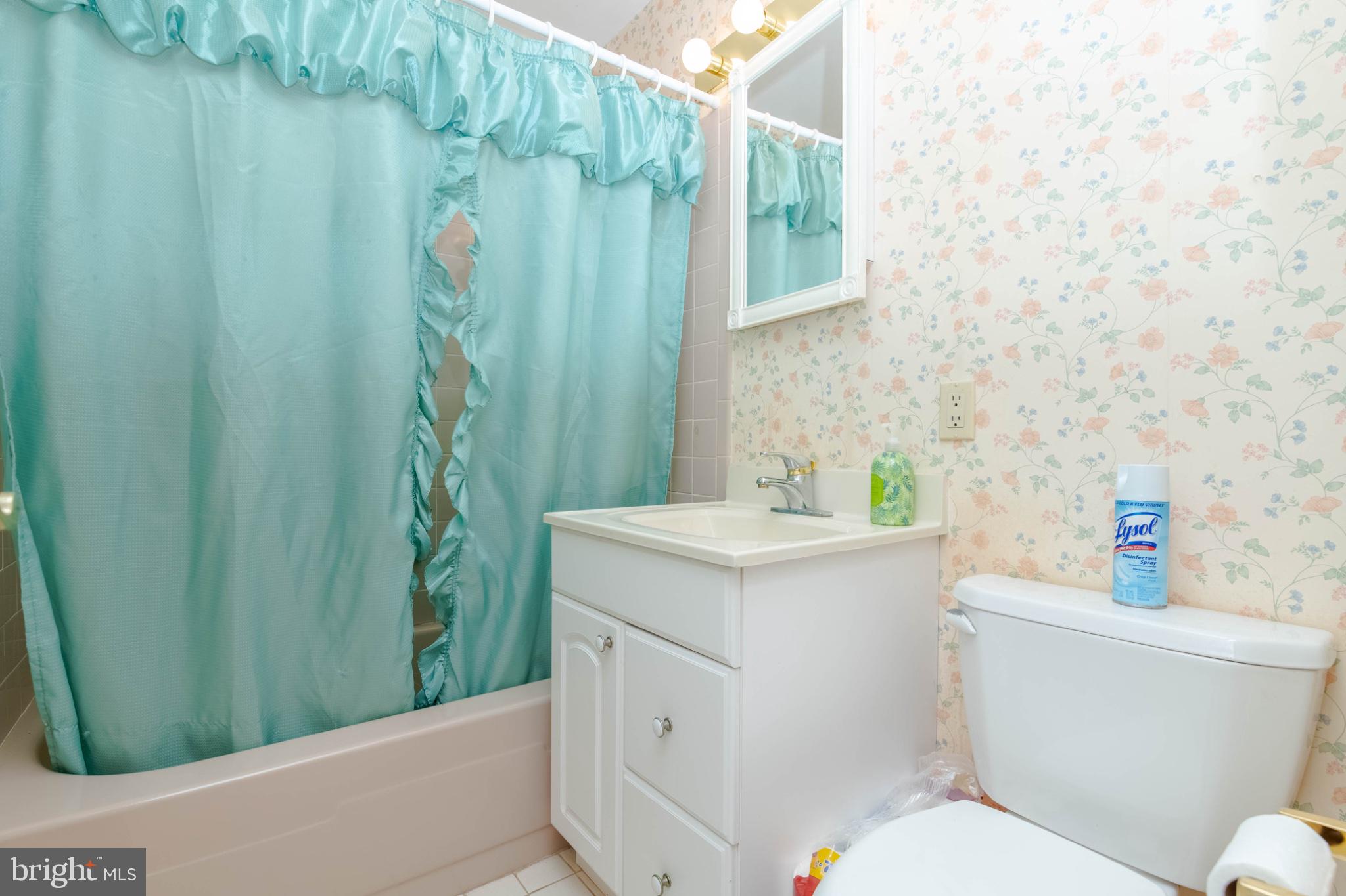 1909 Nelson Mill Road Jarrettsville, MD 21084 - Photo 35 of 65 a bathroom with a sink a toilet and shower curtain
