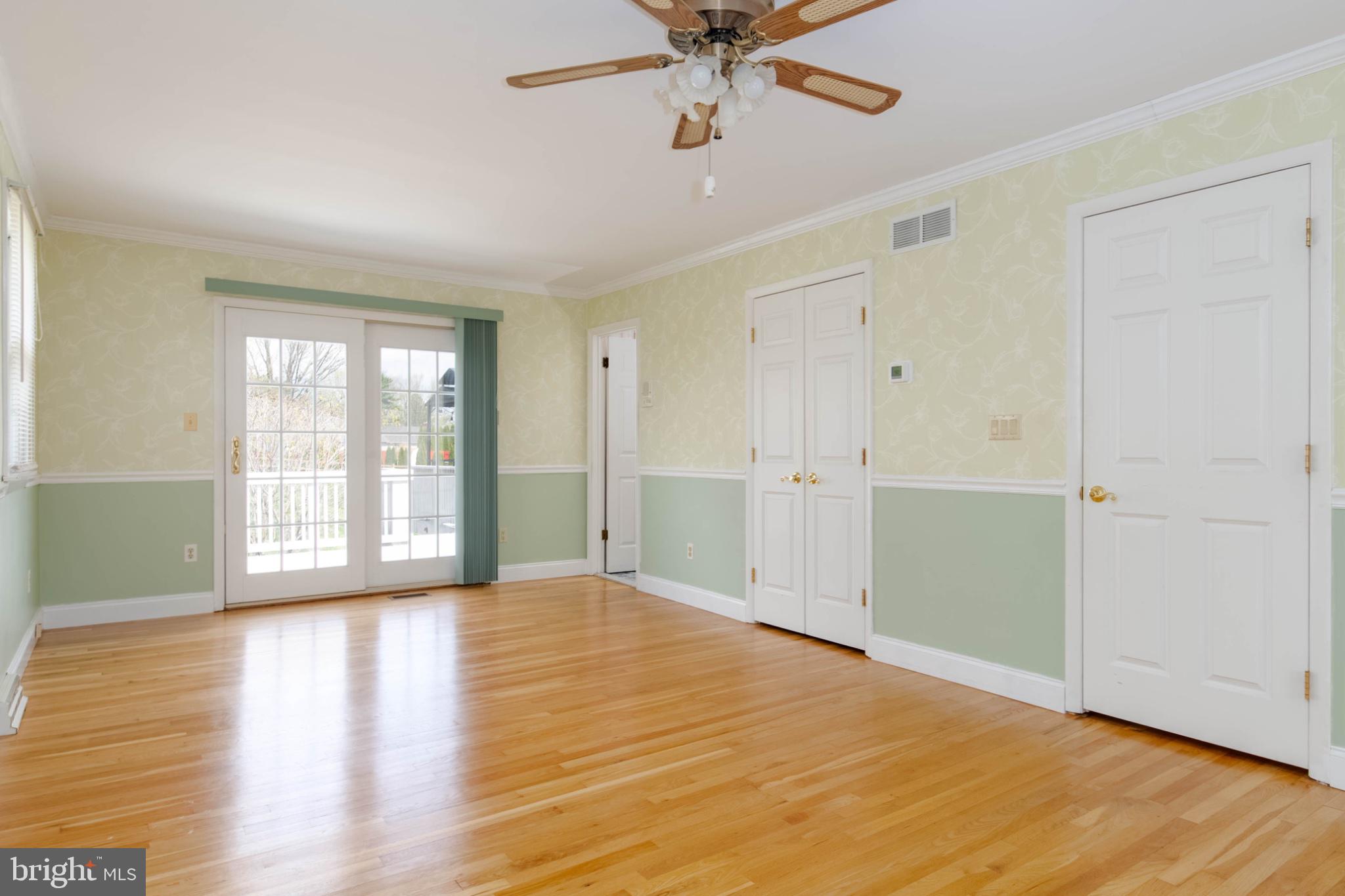 1909 Nelson Mill Road Jarrettsville, MD 21084 - Photo 42 of 65 a view of an empty room with wooden floor and a window