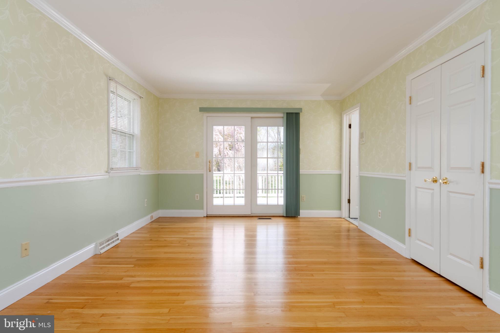 1909 Nelson Mill Road Jarrettsville, MD 21084 - Photo 43 of 65 a view of an empty room with wooden floor and a window
