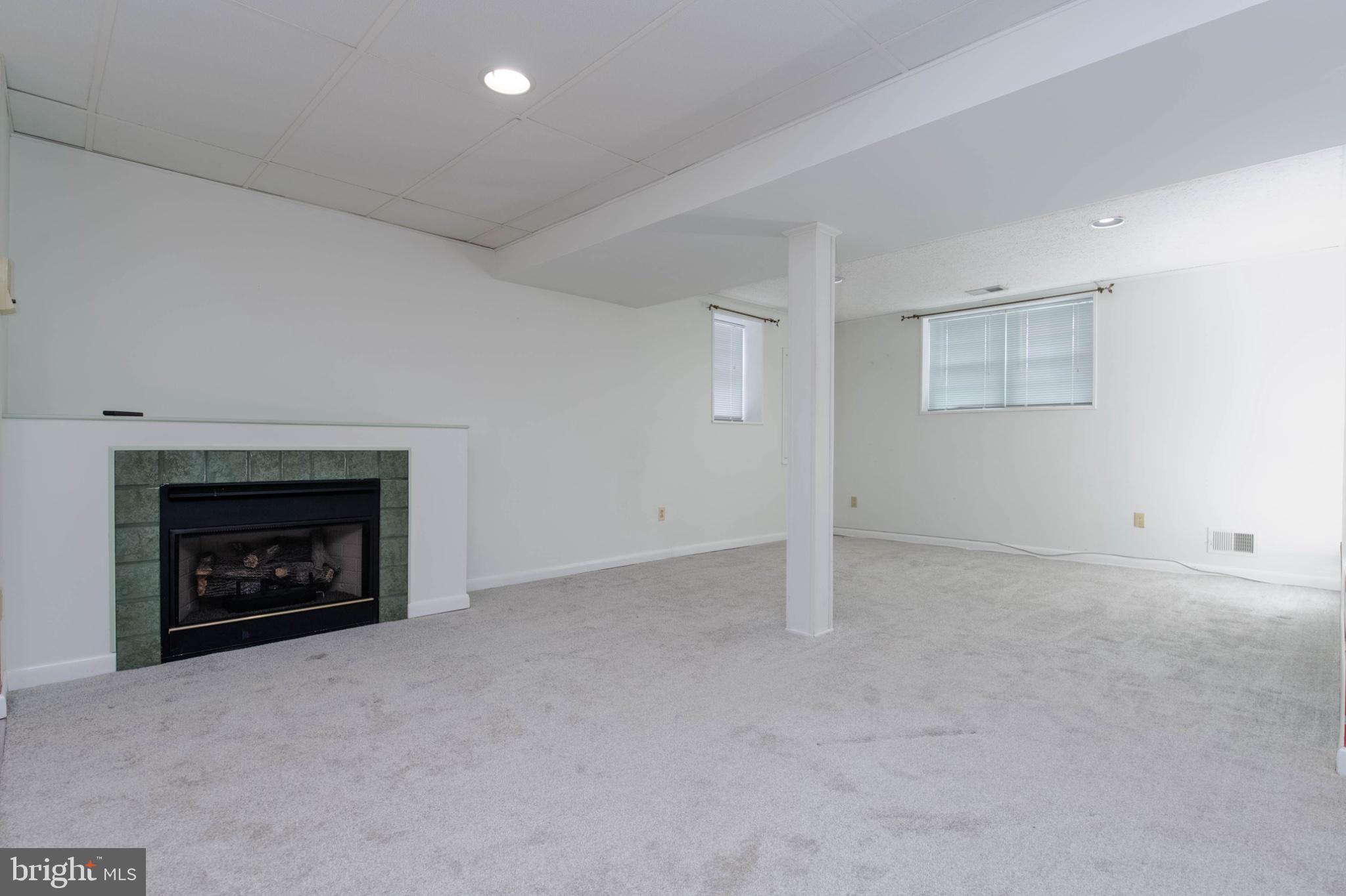 1909 Nelson Mill Road Jarrettsville, MD 21084 - Photo 53 of 65 an empty room with a fireplace