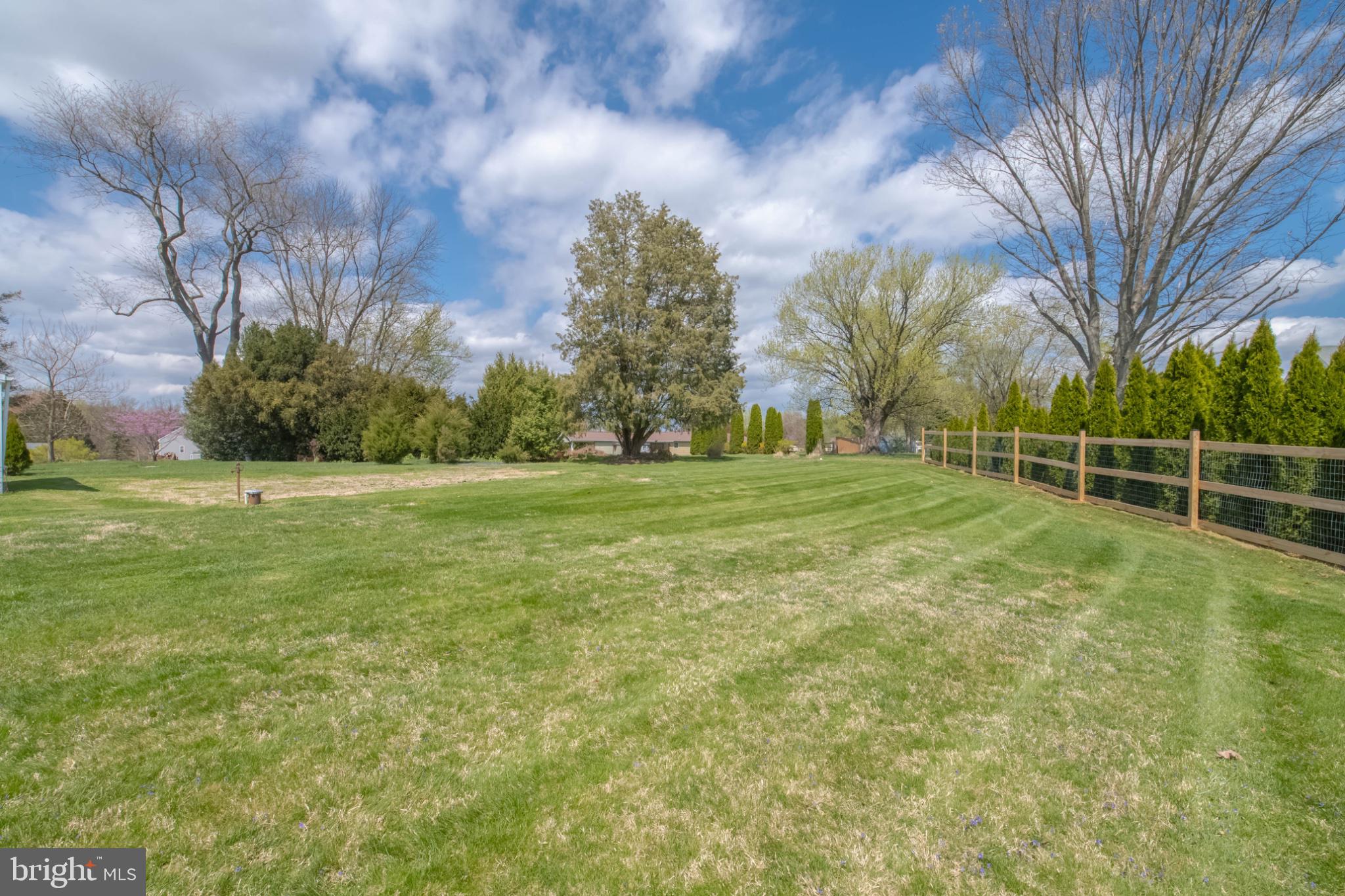 1909 Nelson Mill Road Jarrettsville, MD 21084 - Photo 8 of 65 a view of a field with trees in the background