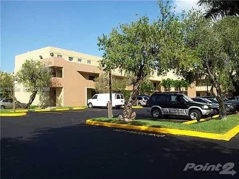 a view of a swimming pool with an outdoor space