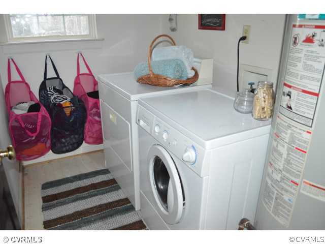 3233 Ransom Hills Road Richmond, VA 23237 - Photo 12 of 15 a utility room with a sink dryer and washer