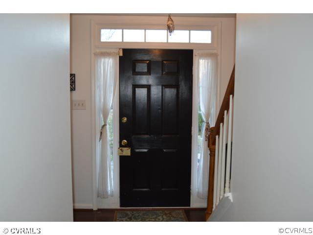 3233 Ransom Hills Road Richmond, VA 23237 - Photo 2 of 15 a view of a hallway with wooden floor