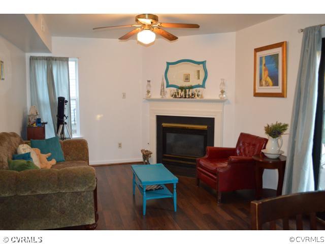 3233 Ransom Hills Road Richmond, VA 23237 - Photo 4 of 15 a living room with furniture and a fireplace