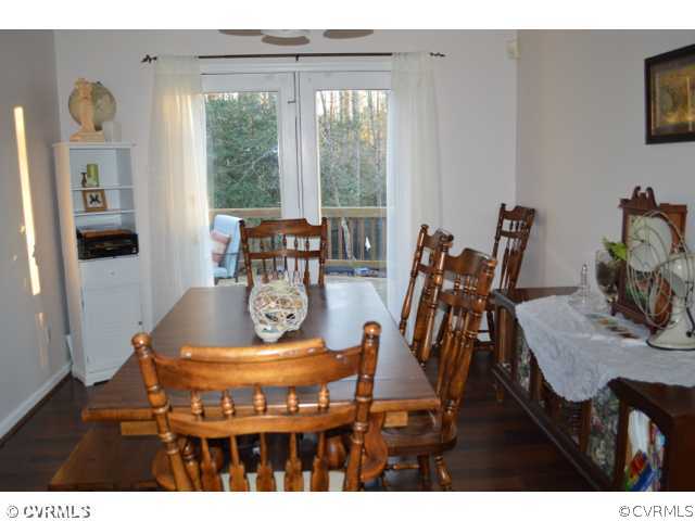 3233 Ransom Hills Road Richmond, VA 23237 - Photo 5 of 15 a dining room with furniture and window