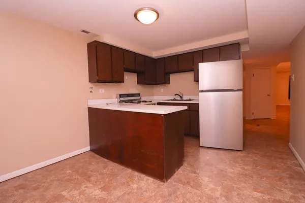 a kitchen with a sink and a cabinets