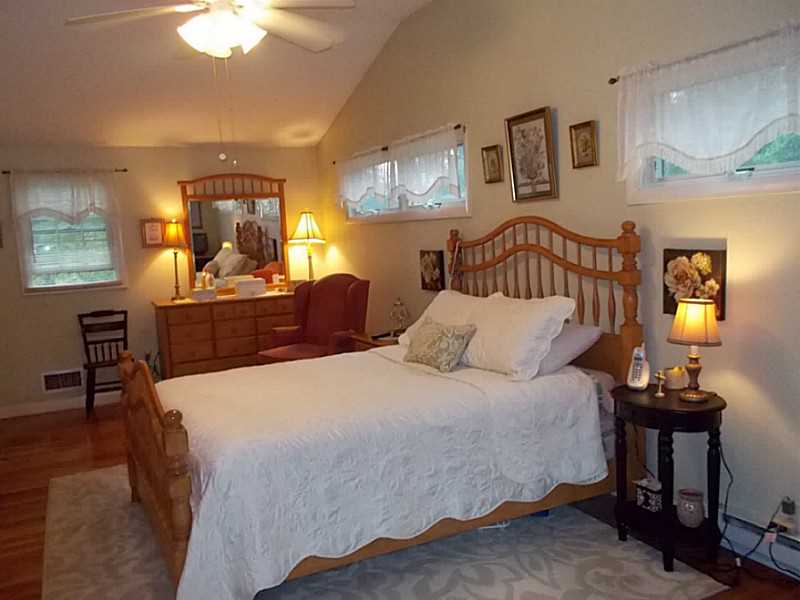 151 Chadsey Road North Kingstown, RI 02852 - Photo 12 of 23 Master Bedroom. The master is huge because it is combined 2nd and third bedroom Put up the wall if you need 3bedroom...but.now a.lavish Master!