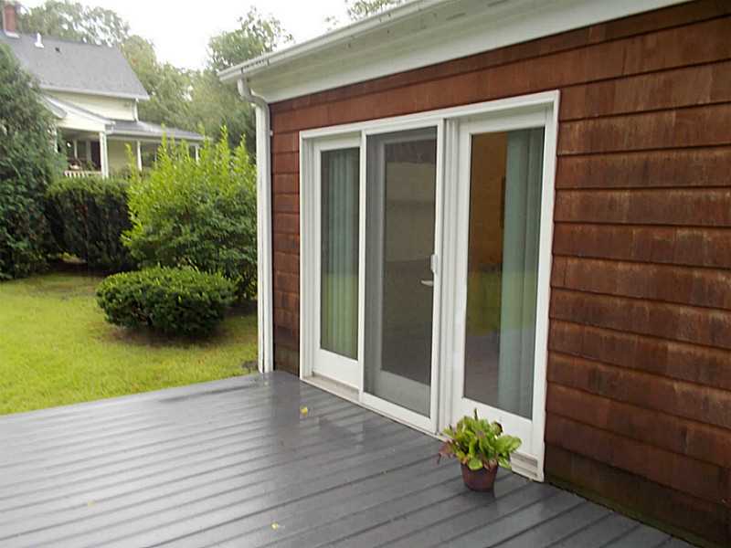 151 Chadsey Road North Kingstown, RI 02852 - Photo 20 of 23 Patio/Deck. Sliders from the dining room to the deck...sliders from kitchen and also master bedroom!