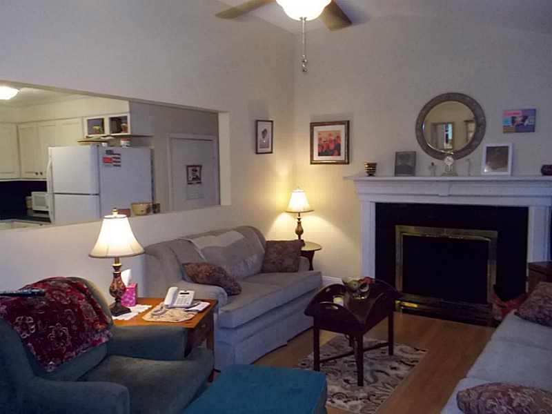 Living Room. If you like open and airy, notice the pass through to the kitchen...that wall just opens up everything.