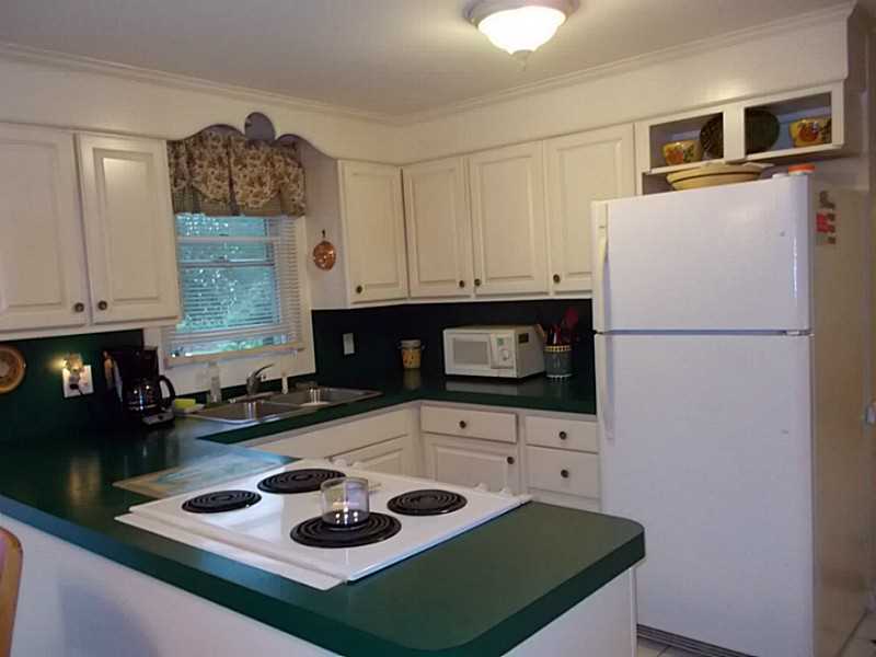 Kitchen. Decorator touches enhance the beauty of this home!