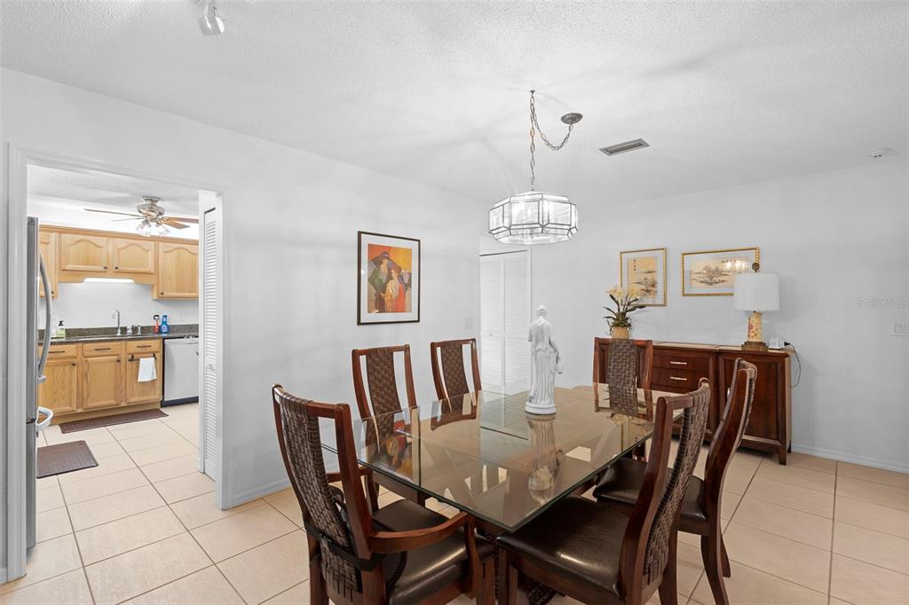920 Shady Branch Trail DeLand, FL 32724 - Photo 28 of 46 a view of a dining room with furniture