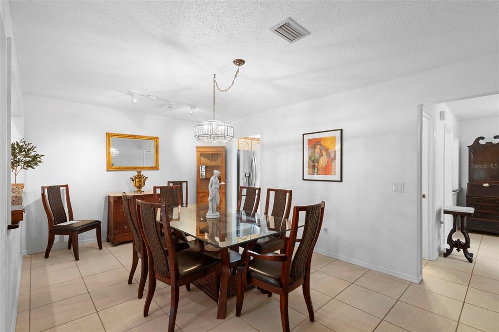 920 Shady Branch Trail DeLand, FL 32724 - Photo 29 of 46 a view of a dining room with furniture