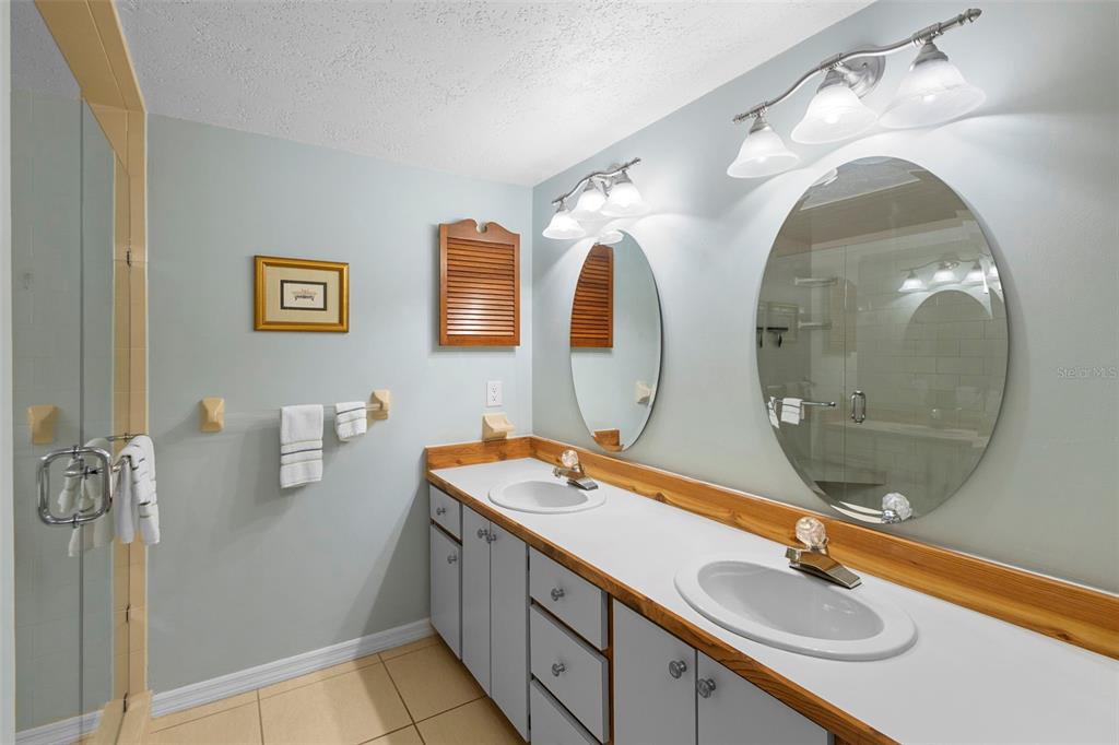920 Shady Branch Trail DeLand, FL 32724 - Photo 33 of 46 a bathroom with a sink and mirror